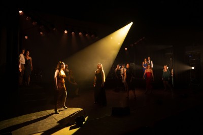 Production still of cast in 'Beginners Please!', performance by GSA Cert HE Foundation students' production