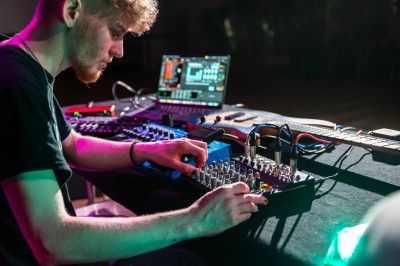 CMT student at a control panel