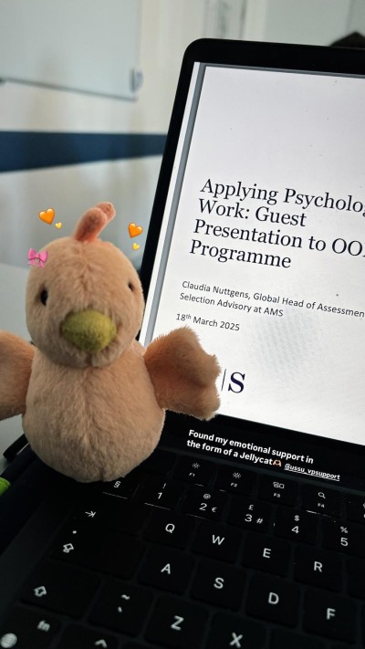 Mobile phone showing Occupational and Organisational Psychology MSc presentation