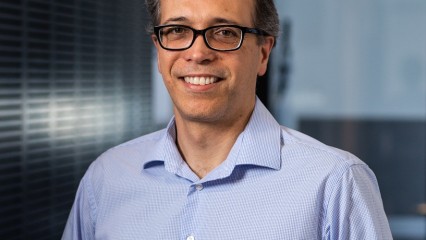 Head and shoulders of Gustavo, smiling