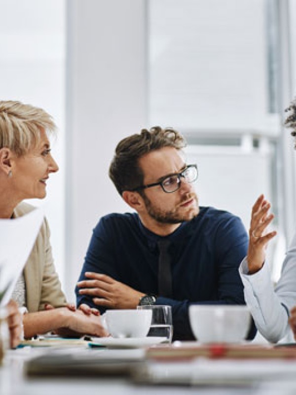 People talking at a table
