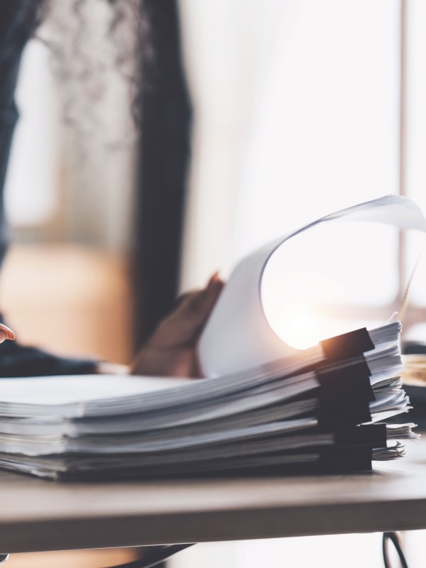 Bundles of manuscripts being proofed