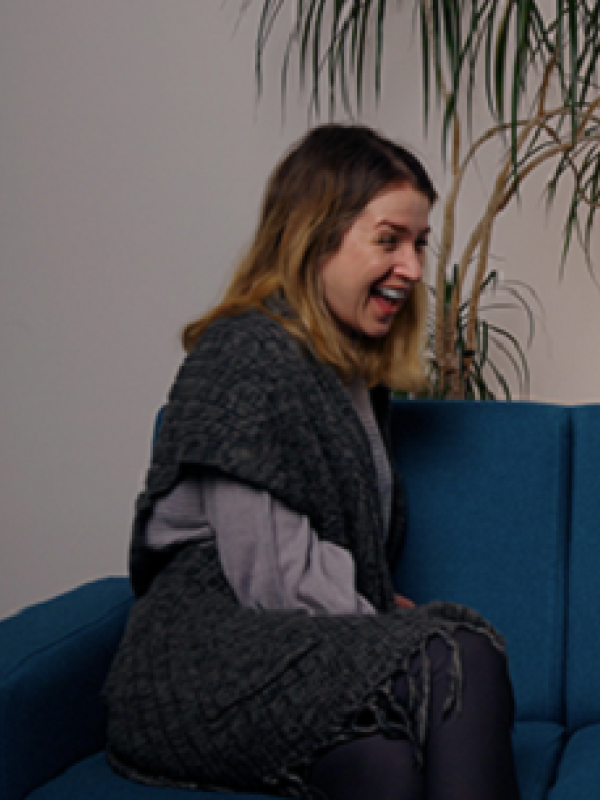 Dr Emily Setty on the sofa