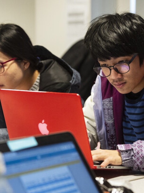 Students working on laptops
