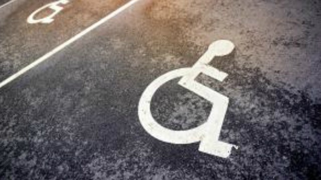 A disabled parking sign