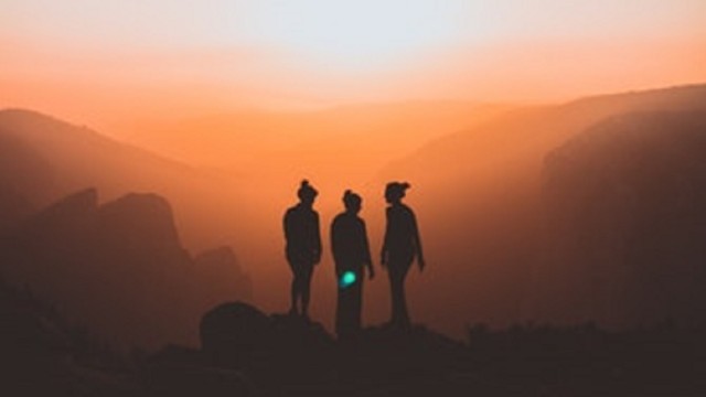 Silhouettes of three women