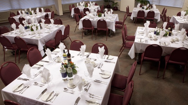 Conference tables set up for event at Wates House