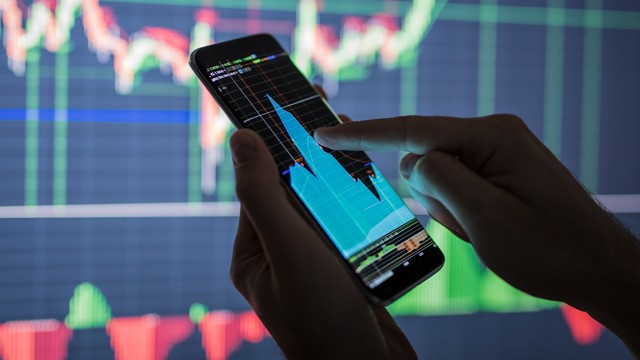 Phone in front of screen