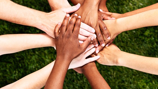 Hands on top of hands