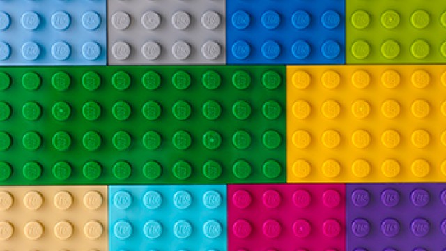 An aerial shot of multi-coloured lego bricks