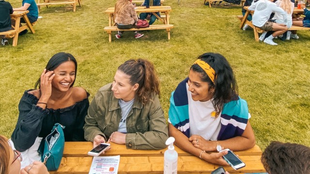 Smiling Students by the Lake