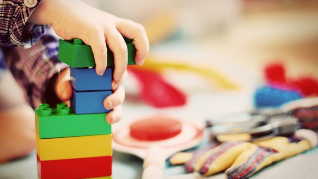 A child playing with building blocks