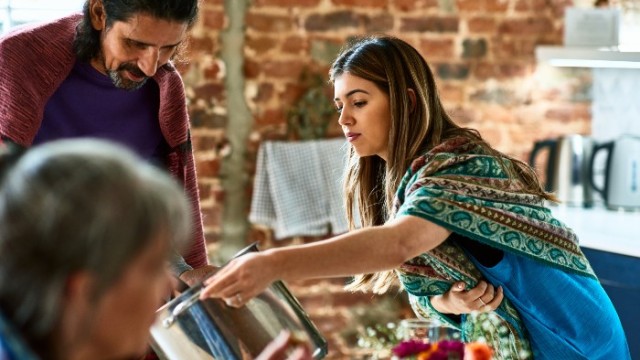volunteer serves food