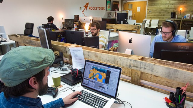 Team members of Rocketdesk in their office in the Surrey Research Park