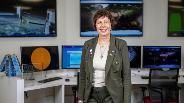 Dr Nicola Fox in the control room at the Surrey Space Centre