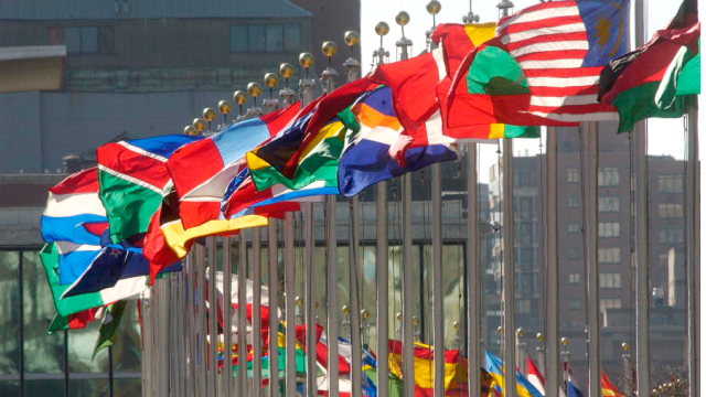 UN flags billowing in a dramatic fashion