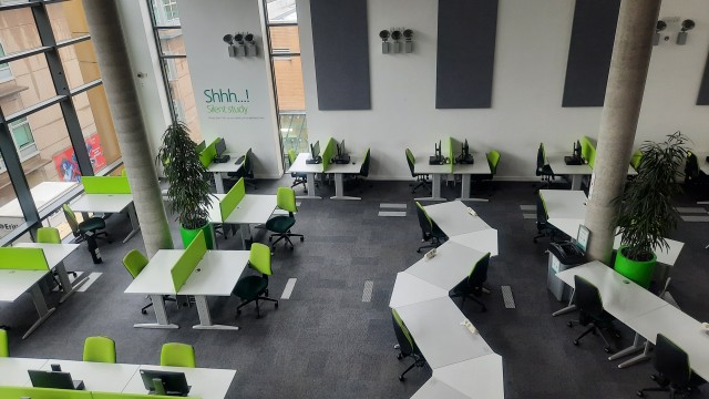 View of desks and computers in Level 1 Silent Study area