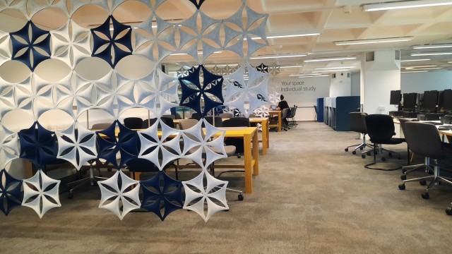Snowflake sound barrier and desks on level 3 of the Library