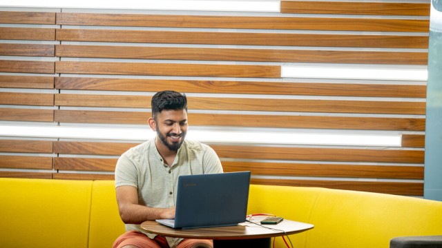 Postgraduate Student working on laptop
