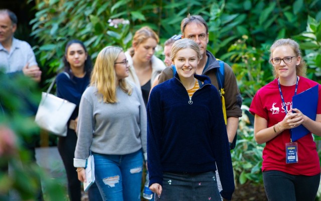 A group of people on a campus tour