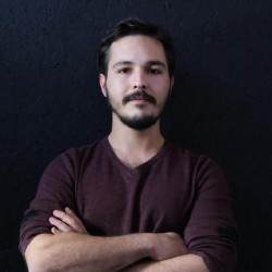 Photo of Karahan Sahin, arms crossed