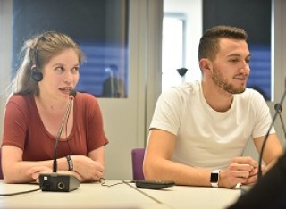 Two Surrey students engaged in a translation exercise