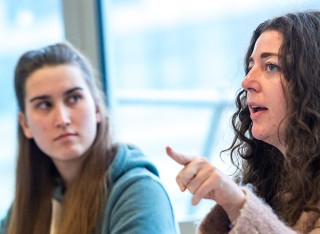 A student in class taking