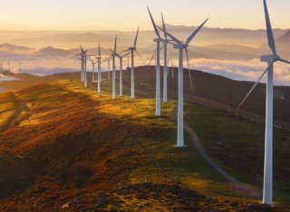 Wind turbines on a hill in the countryside