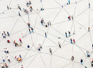 Aerial view of crowd connected by lines 