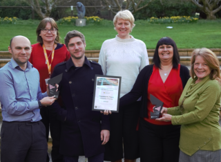 The University of Surrey Placement Team pose with their 2019 and 2020 awards