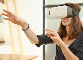 Woman using Virtual Reality headset