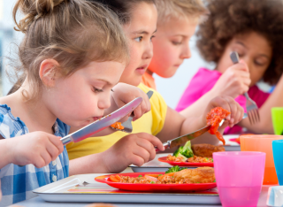 children eating a lunch at school