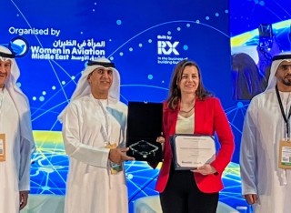 Dr Nadine Itani winning leading woman in aviation award at Airport Show in Dubai, May 2025