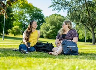 Students sitting on the grass