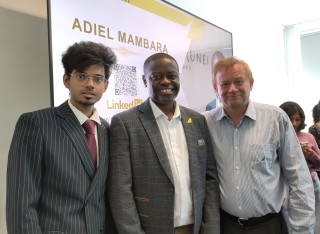 Royal Brunei's Satheesh Durai and Adiel Mambara with University of Surrey's Dr Frankie O'Connell at Air Transport Management MSc careers talk