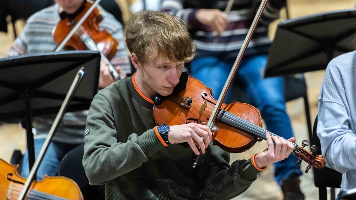 Violinist rehearsing for Surrey Orchestra Day, November 2021