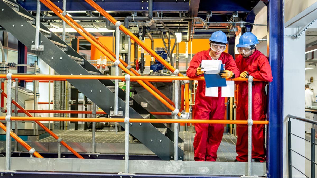 Checking over the paperwork in our Chemical Pilot Plant