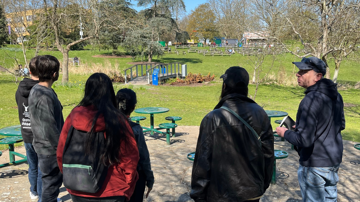 Group of students learning about biodiversity at Surrey