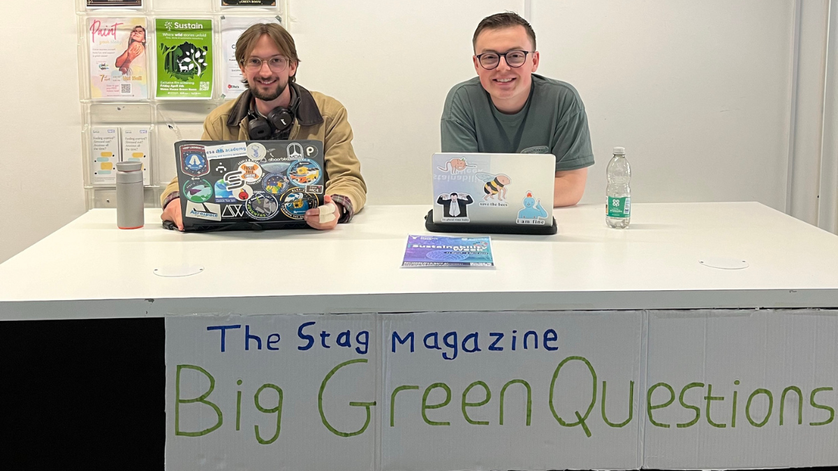 Two students hosting a sustainability pop-up 