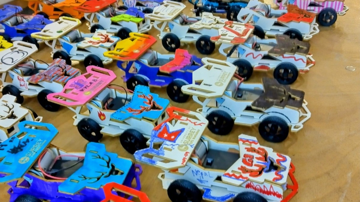 Toy electric vehicles lined up