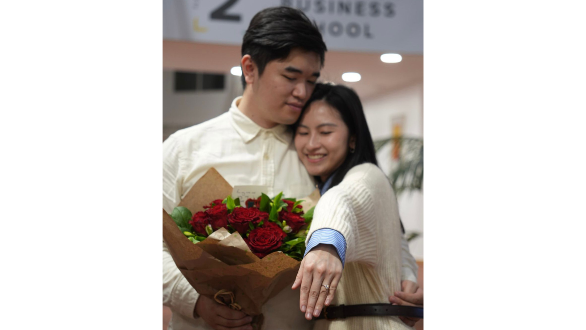 A photograph of Lok Kio Wong and Wing Han Hui after getting engaged